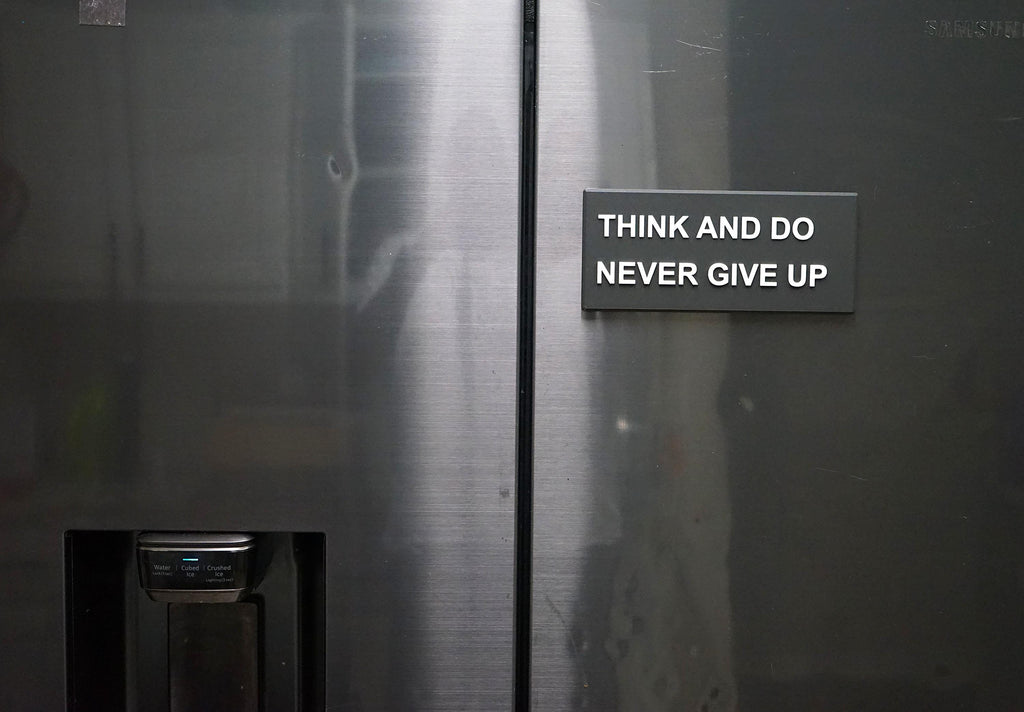 Inspiration "Think and Do Never Give Up" Plaque