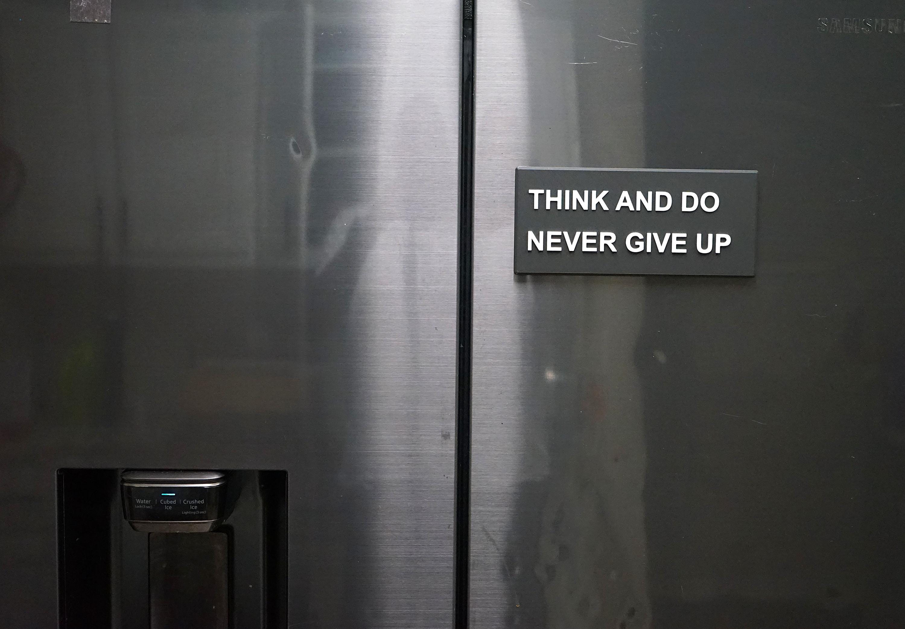 Inspiration "Think and Do Never Give Up" Plaque